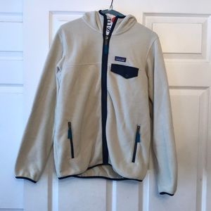 Beige Patagonia zippered hooded jacket